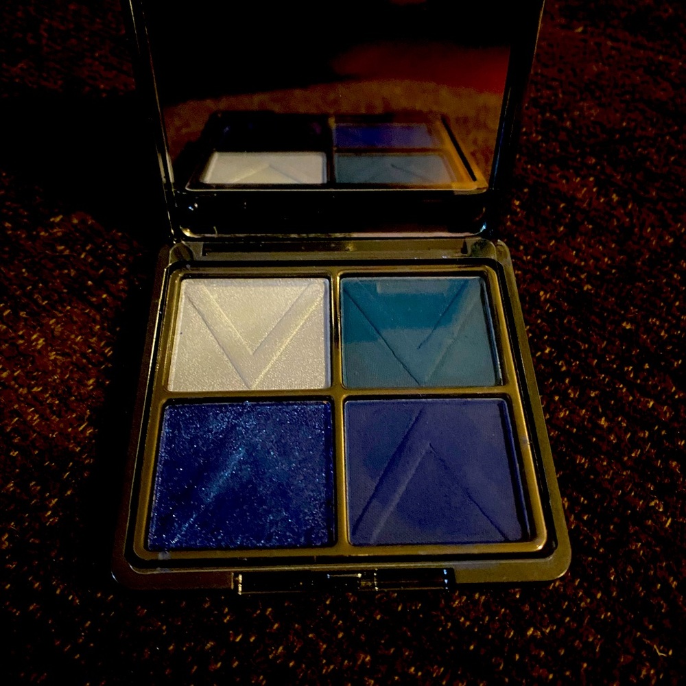 A brand new Revolution X quad eyeshadow palette.